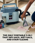 Person using EveryMess Ultra Powerful Mess Busting 3 In 1 Wet Vacuum Dry Vacuum And Stain Eliminator With StainForce Technology.