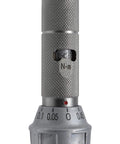 Close-up of Adjustable Torque Wrench 1-5 Nm With 0.05 Nm Graduations And +/-3 Percent Accuracy, showing knurled handle and scale.