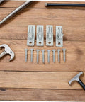 Heavy Duty Wall Mount Gate Hinge Set Featuring Four Galvanized Iron Plates and screws on wooden surface for barn doors