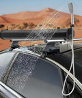 Self Pressurizing Camping Shower Water Tank 18L Roof Rack Mount Overland Tank For Easy Off Road Adventures Road Trip Ready Solar Powered Large Capacity Car Wash Beach Travel mounted on a vehicle with water spraying.