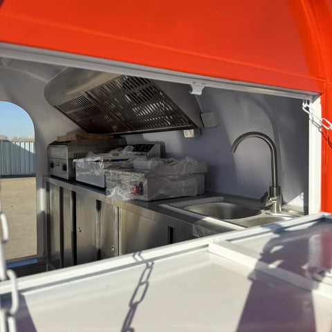 Fully Custom Mobile Food Trailer Concession Rig With Complete Commercial Kitchen For Festivals Pop Up Vendors Dessert Trucks And Drink Bars Built Tough And Ready To Roll interior with stainless steel appliances and sink.
