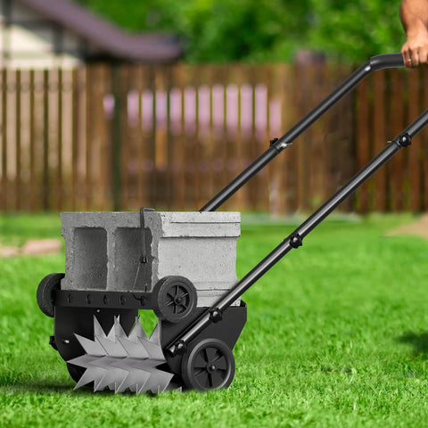 18 Inch Heavy Duty Push Spike Lawn Aerator With Four Wheels Steel Handle Foam Armrests Manual Aerator In Use On Lawn