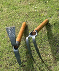 Go-To Two-Piece Garden Pick And Hoe Set, 19.6 inch, carbon steel with wooden handle on grass for digging and planting