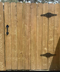 Heavy Duty Barn Door Handles 7.5 Inch Cast Iron Gate Pulls For Outdoor Gates Sheds And Sliding Barn Doors In Black Matte Finish Rust Resistant Powder Coated Built Tough 2 Pack With Mounting Screws installed on wooden gate.