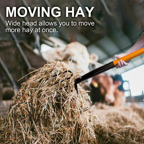 Using a 5 Tine Pitchfork For Gardening Heavy Duty With Fiberglass Handle in a barn to move hay efficiently.