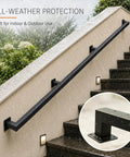 Dead Tight Six Foot Industrial Pipe Hand Rails For Indoor Stairs And Outdoor Decks Featuring Sleek Matte Black Finish with wall mounts in rainy weather.