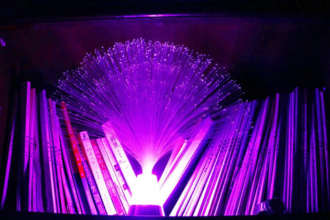 Remote Control Fiber Optic Party Lantern LED Table Centerpiece With Multicolor Changing Lights in a bookshelf display