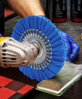 Konvixon 8-inch airway buffing wheel attached to angle grinder; blue pleated wheel with metal center