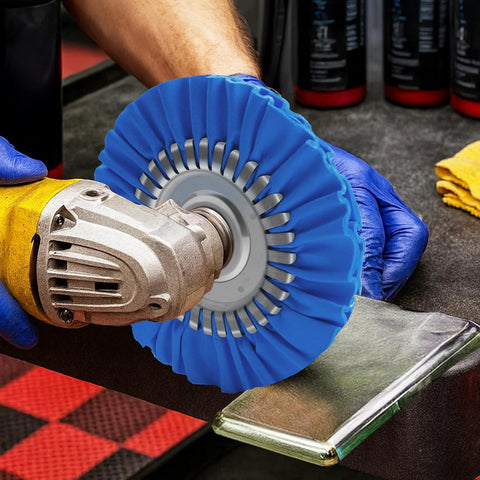Konvixon 8-inch airway buffing wheel attached to angle grinder; blue pleated wheel with metal center