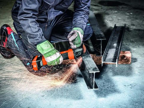 Pro Rig Cordless Angle Grinder With 125 Mm Disc And 18 Volt Brushless Motor Cranks Out 1100 Watts Of Torque in use on metal work.