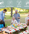 Family enjoying picnic with All-in-One Picnic Table Cover Set With Bench Covers For 6 Foot Tables, Flower Print in park