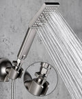 Installed brushed nickel brass shower valve with lever handle and square rainfall head; close-up of valve connection