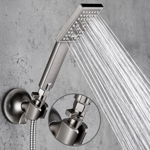 Installed brushed nickel brass shower valve with lever handle and square rainfall head; close-up of valve connection