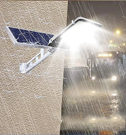 Outdoor Solar Security Flood Light With Remote And Dusk To Dawn Sensor Super Bright Led Yard Lighting Badass Weatherproof mounted on wall with rain.