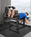 2 In 1 Leg Extension And Curl Machine For Home Gym Full Leg Day Trainer with user targeting quads and hamstrings in gym setting