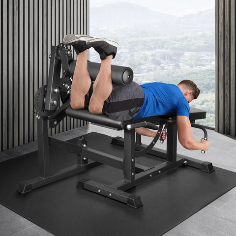 2 In 1 Leg Extension And Curl Machine For Home Gym Full Leg Day Trainer with user targeting quads and hamstrings in gym setting