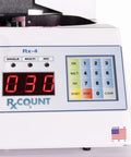 Close-up of the Rx-4 Automatic Pill Counting Machine control panel showing buttons and display for pharmacies and veterinarians.
