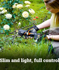 Person using 20V Nitro Pruning Shear And Lopper WG330 Cordless With Titanium Plated Blade Brushless Motor Ergonomic Grip in garden