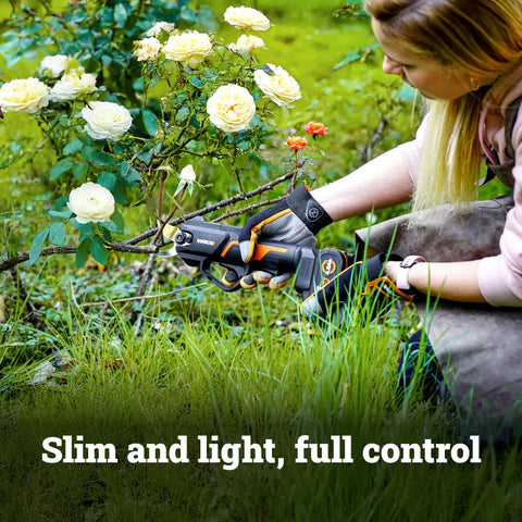 Person using 20V Nitro Pruning Shear And Lopper WG330 Cordless With Titanium Plated Blade Brushless Motor Ergonomic Grip in garden
