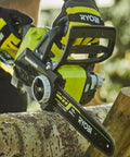 Hella Smooth 18V Brushless Battery Chainsaw With 30Cm Oregon Bar in use, cutting through a log for outdoor wood work.