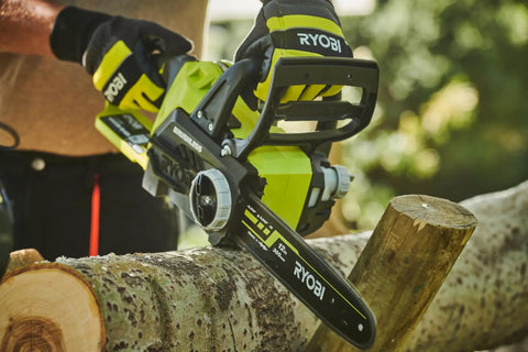 Hella Smooth 18V Brushless Battery Chainsaw With 30Cm Oregon Bar in use, cutting through a log for outdoor wood work.