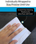 Hand using XL Screen Cleaning Wipes For TVs And Monitors, Streak Free And Fast Drying, Deionized Water Formula That Leaves No Residue