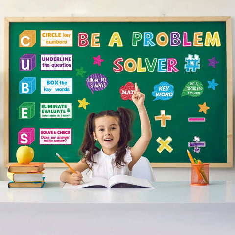 41 Piece Math Bulletin Board Set With Cubes And Math Keywords Paper Cutouts for Summer Classroom, child at desk with board