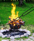 42 Inch Fire Tongs And Fire Poker Set Beefy Heavy Duty Detachable Log Grabbers in use at outdoor fire pit with flames