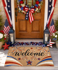 Patriotic 4th Of July Door Mat With Red White Blue Fireworks Design Welcome Mat With Heavy Duty Backing Faux Coco Coir Doormat For Independence Day Outdoor Porch All American Decor in front of a decorated porch.