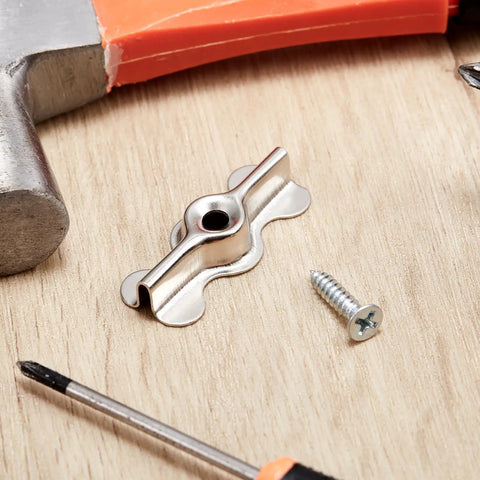 Double Wing Flush Mounting Clips With Screws Alloy Steel Recessed Trim Hardware Silver Drywall Fasteners For Wall Panels 24 Pack on wooden surface with tools.