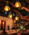 Gen 2 Solar Lanterns For Outdoors With Dual USB And Solar Charging hanging in a cozy patio, warm flame light, evening setting