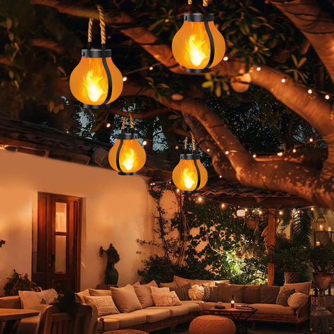 Gen 2 Solar Lanterns For Outdoors With Dual USB And Solar Charging hanging in a cozy patio, warm flame light, evening setting