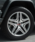 American Flag Wheel Center Caps And 56 Mm Hub Covers With Bold Black Red Detail On Five-Spoke Wheel With Tire