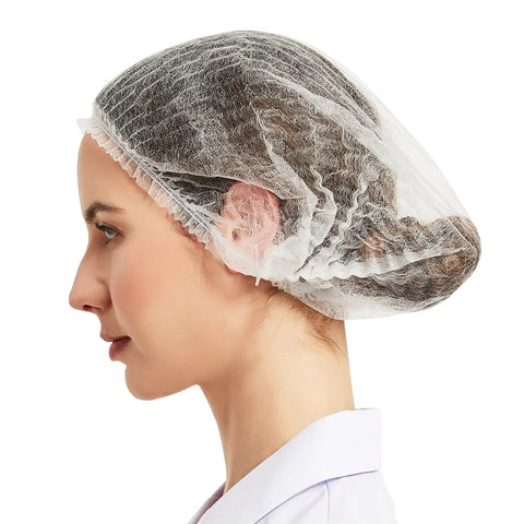 Woman wearing 500 Pack White Disposable Hair Nets Bouffant Caps Elastic Head Covers For Food Service And Spa Use 21 Inch