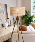 60 Inch Floor Lamp With Faux Wood Tripod Base And Rattan Shade On Off Rotary Switch For Easy Control in cozy living room