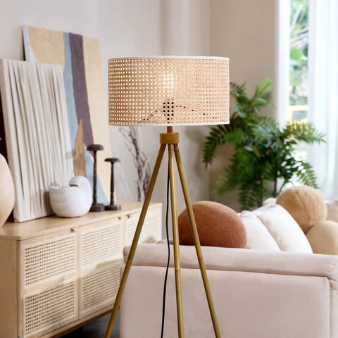 60 Inch Floor Lamp With Faux Wood Tripod Base And Rattan Shade On Off Rotary Switch For Easy Control in cozy living room