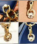 Close-up of 4 gold D-ring rivets on leather purses from 4 Pcs D Ring Rivets For Leather Purses 360 Degree Rotatable Crossbody Conversion Kit