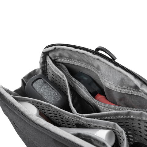Inside view of Small Wash Pouch Travel Toiletry Bag Weatherproof With Upright Or Hanging Design, showing mesh pockets and compartments.