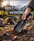 Hand using ultralight backpacking trowel shovel for camping and hiking, 27g anodized aluminum tool, digging in dirt at campsite