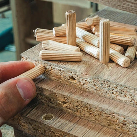 100 Pack Wooden Dowel Pins 8X30MM Hardwood Twist Groove Pegs With Tapered Ends Hella Strong Hardware in use for furniture repairs.