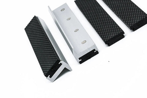 Rock Solid Six Inch Aluminum Vise Jaws Featuring Thick Rubber Gripping Pads and Super Strong Embedded Magnets, showing a close-up view of the jaws.