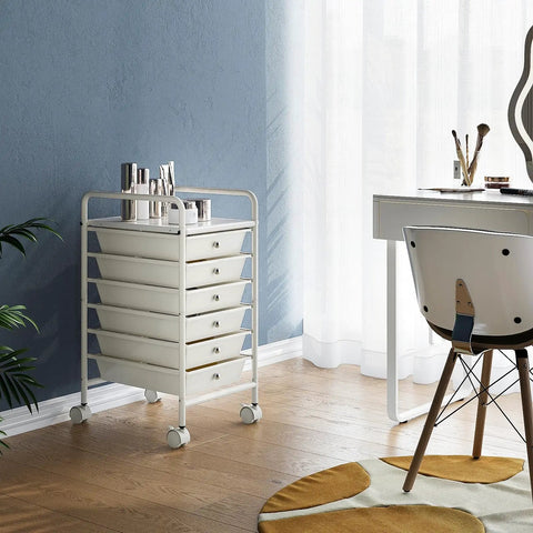 Six Tier Utility Cart With Six Drawers Rolling Cart With Two Lockable Caster Wheels Multipurpose Mobile Drawer Cart For Office Kitchen And Bathroom Ivory White placed in a stylish room