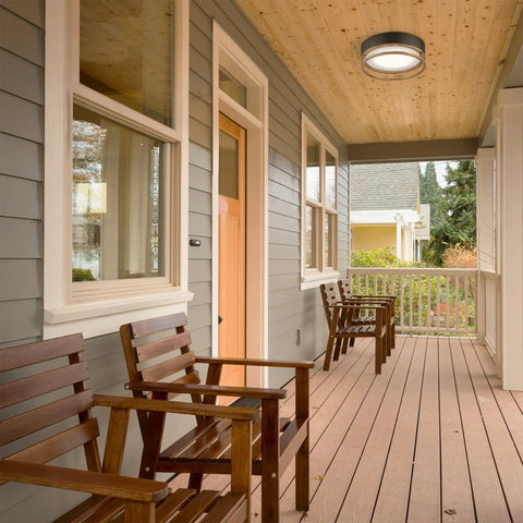 One Light Integrated LED Flush Mount Ceiling Light For Indoor And Outdoor Use on a porch in matte black finish, frosted diffuser