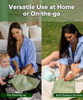 Woman packing Waterproof Wet Bag Set For Baby On The Go with baby at home and outdoors, grass green