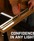 Person using ControlTouch Nite Eye Tape Measure With Anti Pinch Lock on wooden board with 360 degree end hook and 11 foot standout