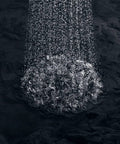 Close-up of water flowing from Bancroft 2.5 GPM Single Function Showerhead With Katalyst Air Induction Technology in use