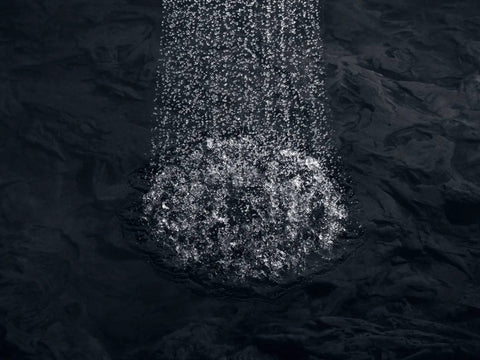 Close-up of water flowing from Bancroft 2.5 GPM Single Function Showerhead With Katalyst Air Induction Technology in use