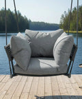 Single Seater Porch Swing Chair With 106 Inch Adjustable Rope For Height Boho Macrame Hanging Hammock Chair For Outdoor Patio Or Bedroom Reading Nook Anti Tip Design With Cushions In Grey Cozy Chill Vibe on wooden deck by lake