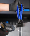 Sheet Metal Seamer Tong 3 Inch Straight Bender For DIY And Pros, a real pro grade tool in use on sheet metal edge.