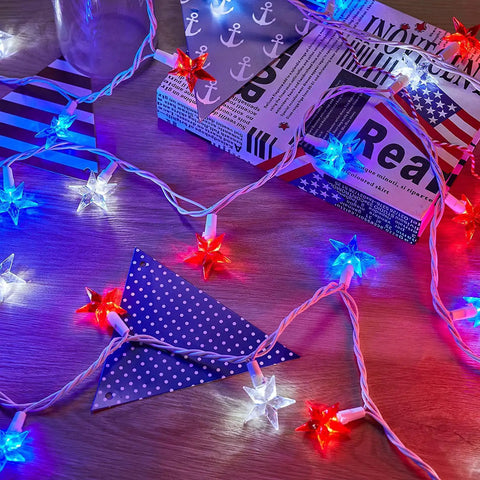 Lit Fourth Of July Decor Red White Blue Stars String Lights 17Ft on wooden table with Independence Day accents